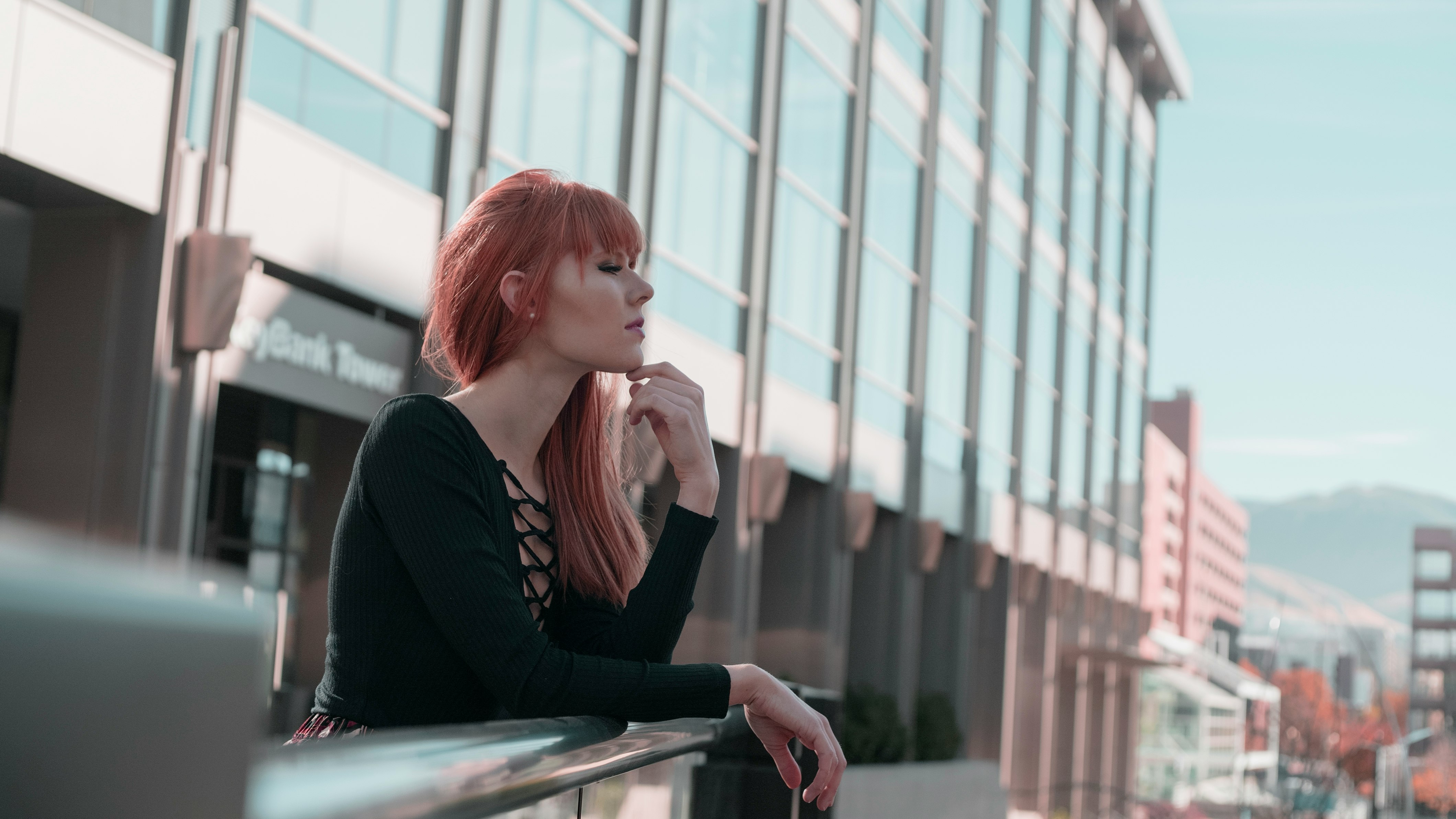 woman wearing black sweater while being photograph